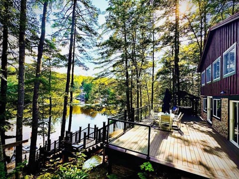 Huge deck with stunning views and hot tub looking over the lake!