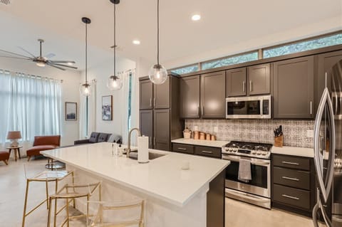 3 Bar Stools, Microwave, Oven, Stove, and plenty of cabinet space for a longer stay :)