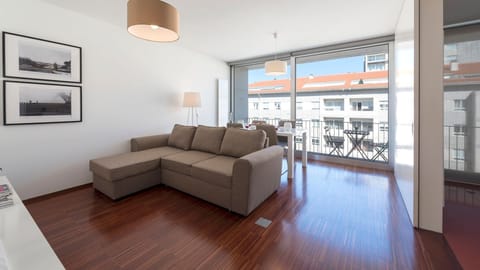 Enjoy the convenience of an open-concept living area that flows effortlessly onto a private balcony, offering a perfect spot for morning coffee or evening drinks. This inviting space is ideal for both relaxation and lively conversation.