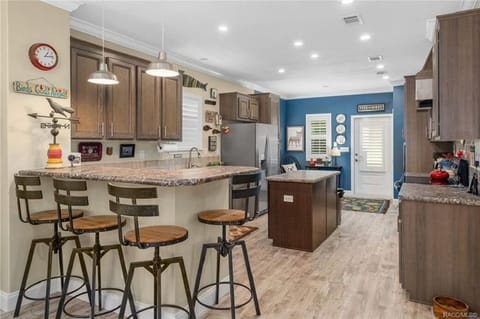 Kitchen and end counter with stools
