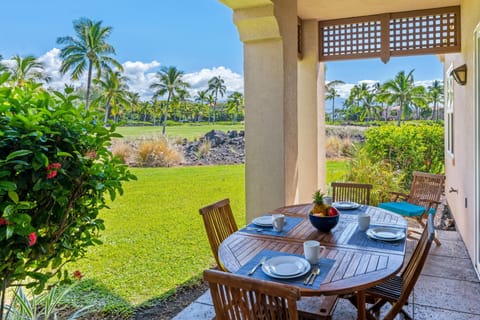 Covered lanai with golf course views