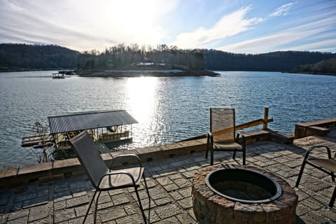 Paver Patio with Firepit. Overlooking Boathouse and main channel.