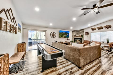 Welcome to the great room where you can warm up by the fireplace, relax during a movie night, and compete in a game of shuffleboard.