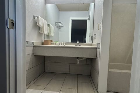 Designer toiletries, towels, soap, shampoo