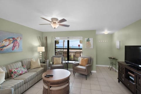 Comfortable living room with plenty of seating, Queen sleeper sofa, 55" Smart TV, beachy decor, and Gulf views!