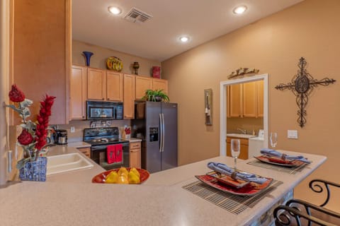 The laundry room is adjacent to the kitchen.