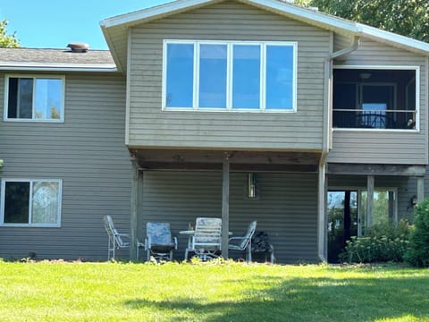 Back of home, facing the lake. Eat outside in your private and secluded space