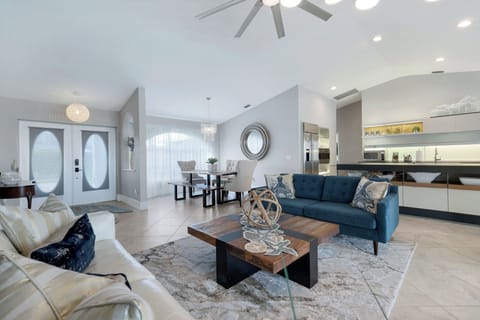 Stylish living and dining area with modern design, natural light, and a welcoming flow throughout the home