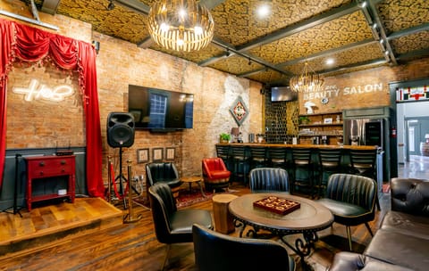 Welcome to the Speakeasy lounge, the heart of this property! And yes, we have a karaoke stage!
