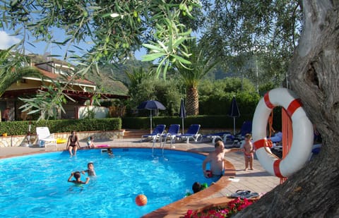 Apartment, 2 Bedrooms, Smoking, Patio | Pool | Outdoor pool, pool umbrellas