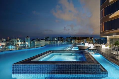 Outdoor pool, open 7:00 AM to 9:00 PM, sun loungers