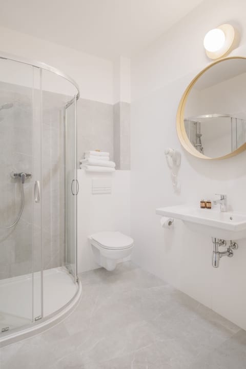 Shower, free toiletries, hair dryer, towels