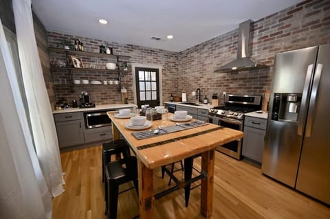 Exposed brick and industrial style kitchen with all new LG appliances.
