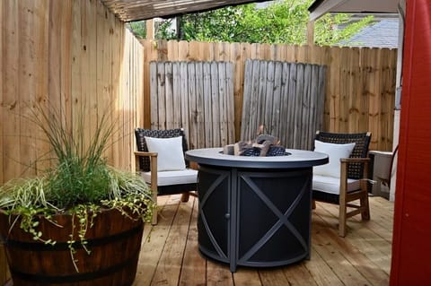An outdoor fire pit warms you on those cool Southern seasonal nights.