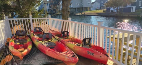 Three kayaks and boat dock