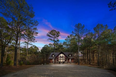 Iron Horse Lodge is on a secluded two acre corner lot with tall pine trees surrounding the cabin