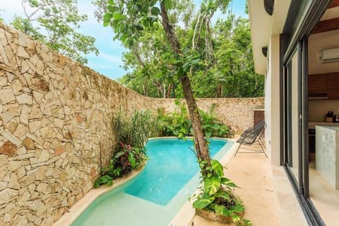 Your private pool directly outside the living space.