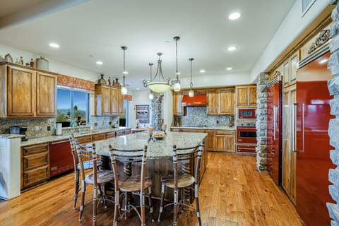 Custom granite counters and top notch Viking appliances will make cooking fun!