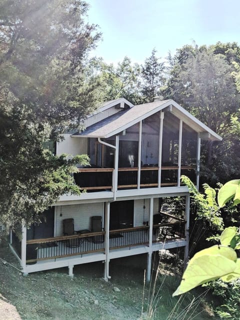 Back of home facing the lake with decks for relaxing and enjoying the view!