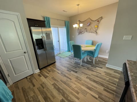 WORK? ONLY IF YOU HAVE TO! Table is great place for laptops to start that book! 