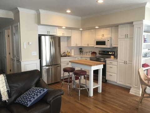 Guest cottage kitchen with new refrigerator and Samsung range with air fryer