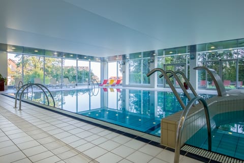 Indoor pool, open 8:00 AM to 9:00 PM, sun loungers