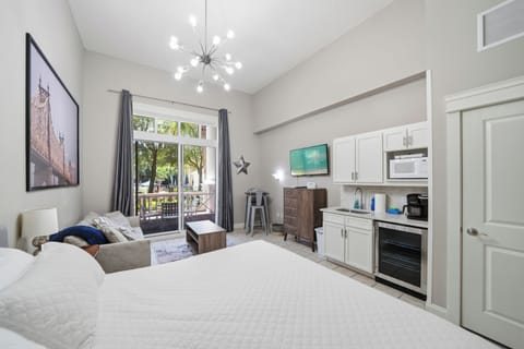 Our mounted smart TV is viewable from both the king-size mattress and queen-size sleeper sofa.