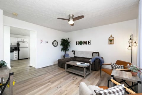 This is our living room equipped with comfy couch, a nice chairs on the side and a center table. A perfect place for the whole family to bond.