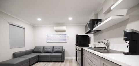 Luxury Presidential Suite with Jacuzzi (310) | Living area | 55-inch Smart TV with cable channels, TV