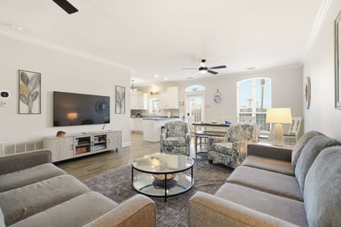 Relax in our comfortably furnished living area, adjacent to the dining area.