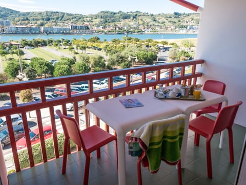 Eat breakfast with your loved ones on your private balcony, watching the sea.
