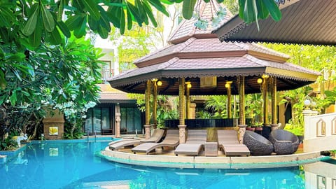 Outdoor pool, open 7:00 AM to 9:00 PM, free cabanas, pool umbrellas