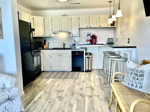 Full kitchen including dishwasher, full size oven, micro, coffee maker, blender,