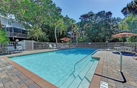 Heated Community Pool with seating for group gatherings