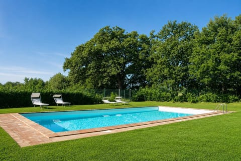 Private pool, terrace, and garden with countryside views