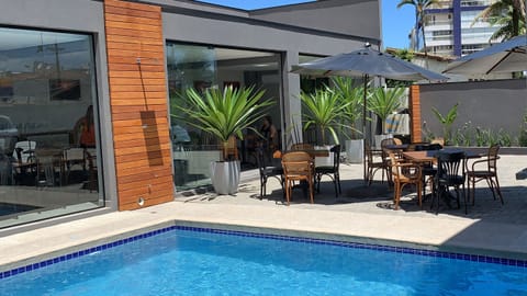 Outdoor pool, open 8:00 AM to 10:00 PM, sun loungers