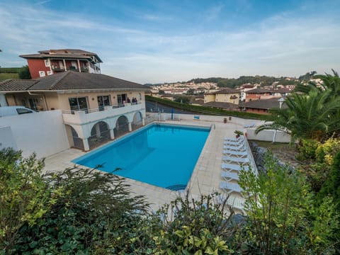 Take in gorgeous views while lounging around the on-site outdoor pool.