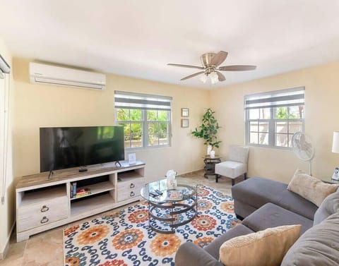 Unwind in this cozy living room, complete with a flat-screen TV for your entertainment.