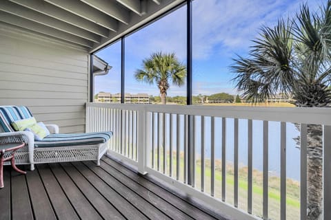Relax on the balcony with lagoon and golf course views