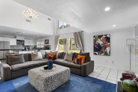 2nd family room with large sofa and tv