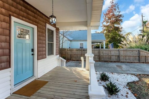 Morning coffee hits differently on this classic Norfolk front porch.