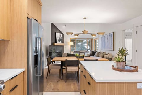 View of the fully-equipped kitchen and dining area