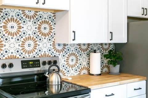 Fully equipped kitchen w/ everything you need to cook or dine in. Electric range