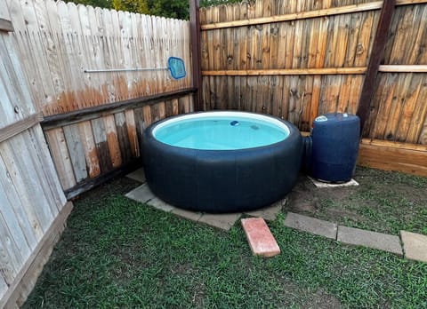 Relax in the Softub Legend® 220.  Accommodates up to 4 adults. 