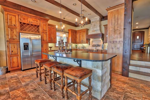 The kitchen features bar seating.