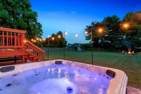6 person hot tub on the back patio.
