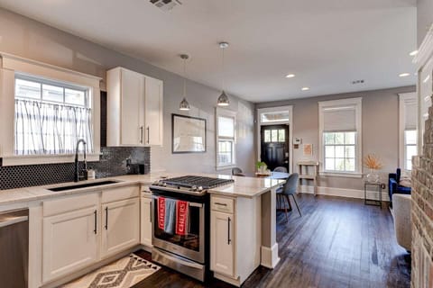 view of the kitchen and the dining room space 