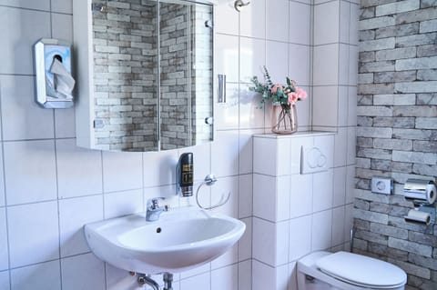 Shower, free toiletries, towels, soap