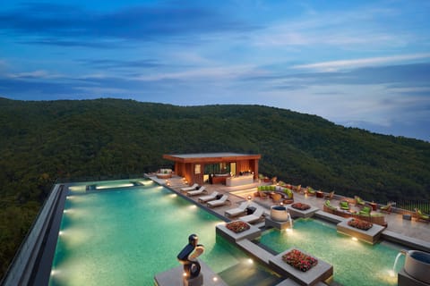 Outdoor pool, pool umbrellas, sun loungers