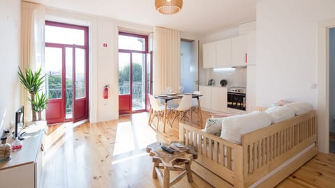 A stylish living area with a sofa bed that can accommodate up to 2 people #porto #portugal #airbnb #stylish